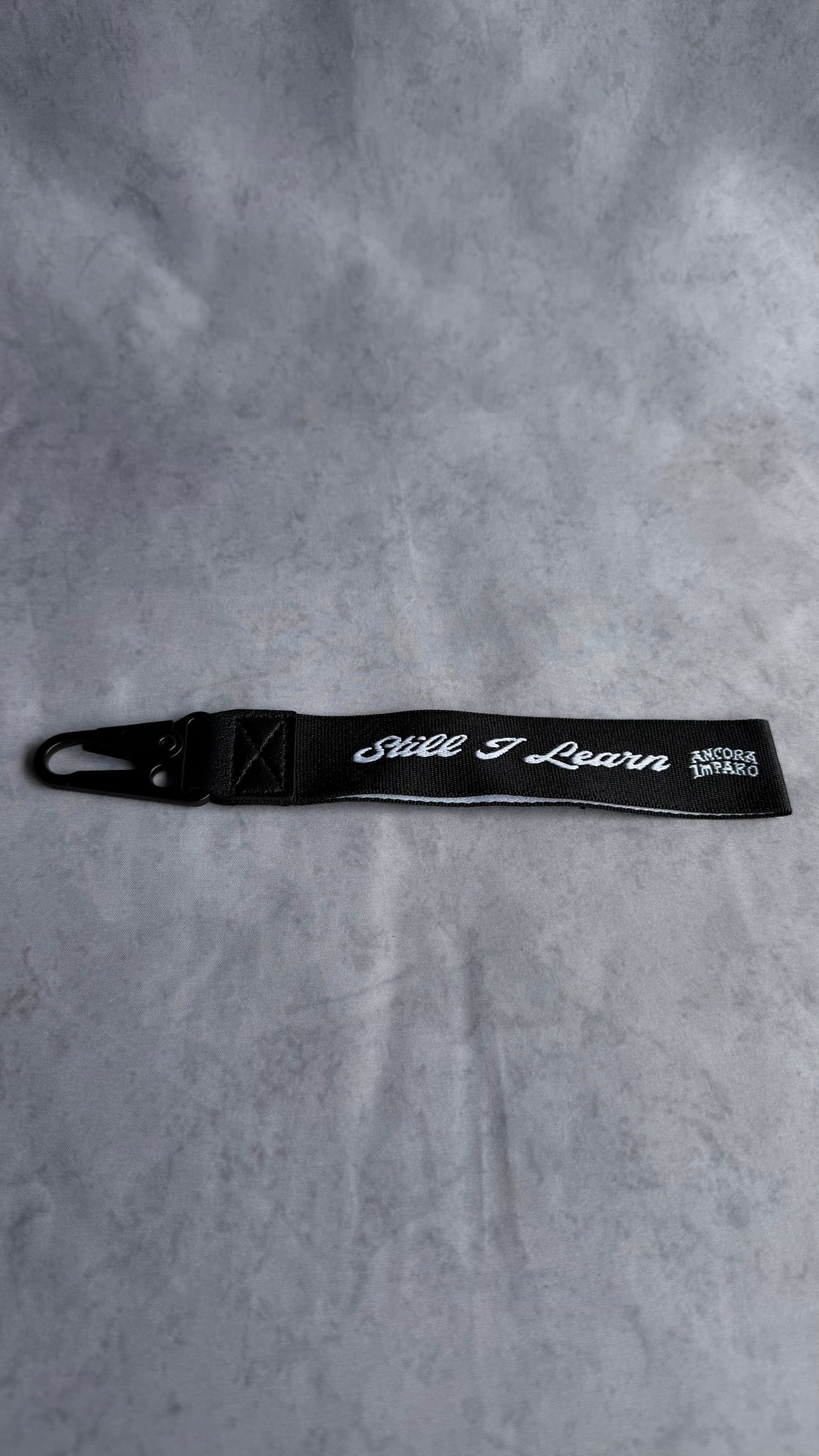 STILL I LEARN KEY STRAP
