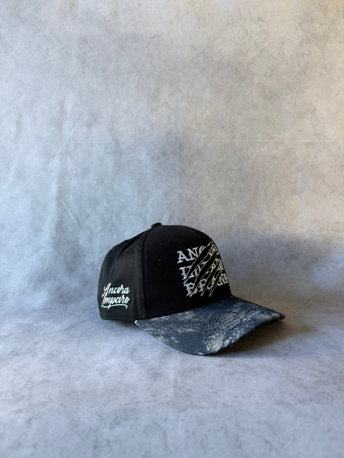 CAPPELLO MIMETICO TIGRATO