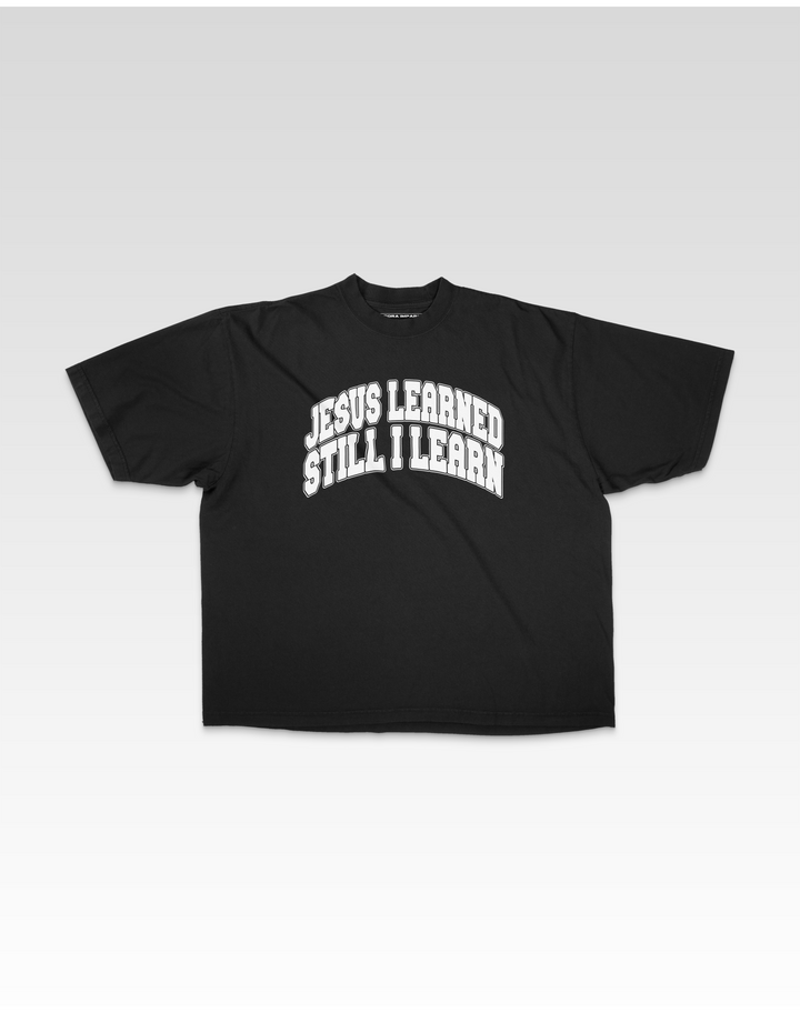HE LEARNED STILL I LEARN TEE IN BLACK