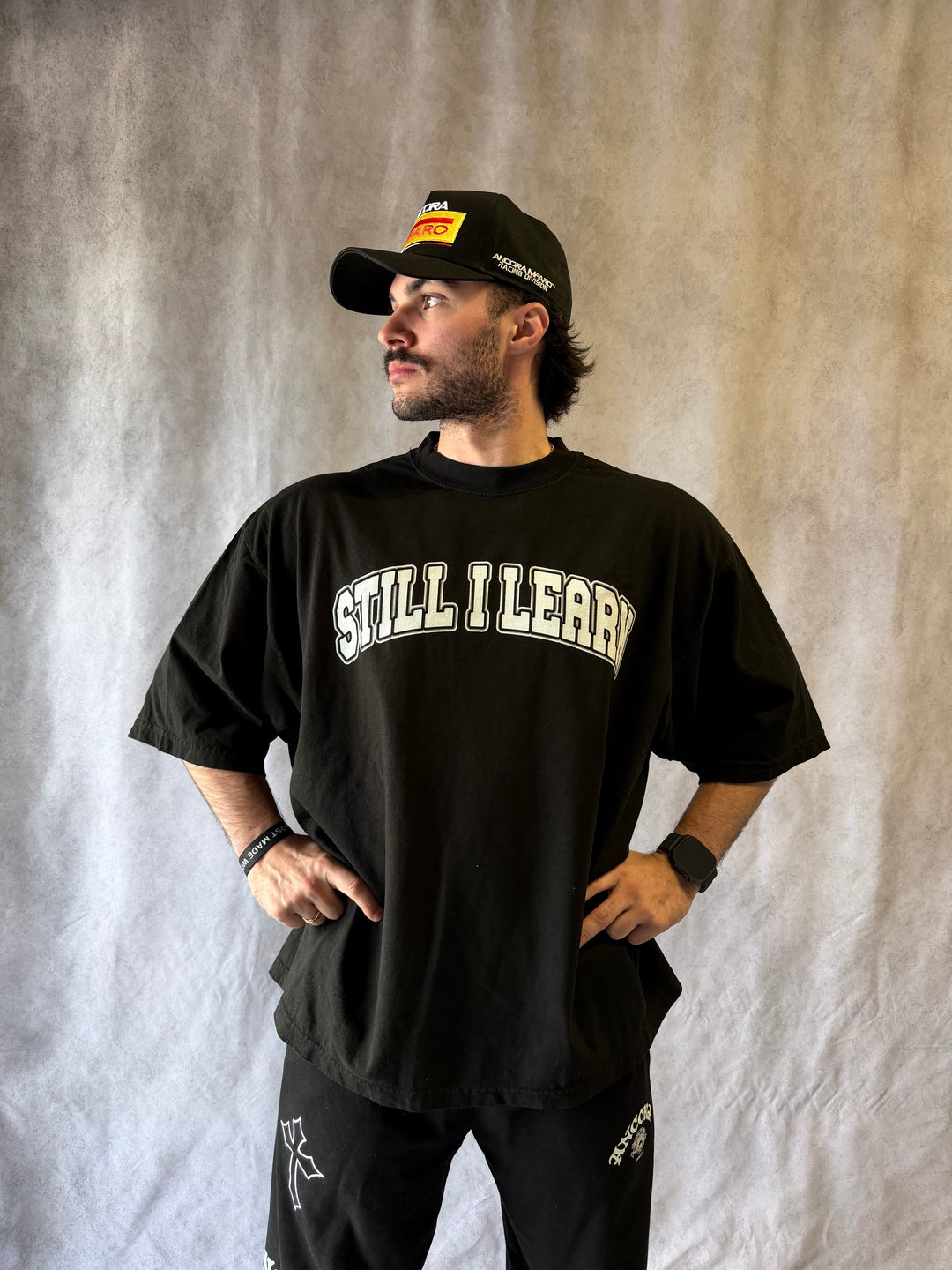 STILL I LEARN WORLD TOUR TEE - BLACK