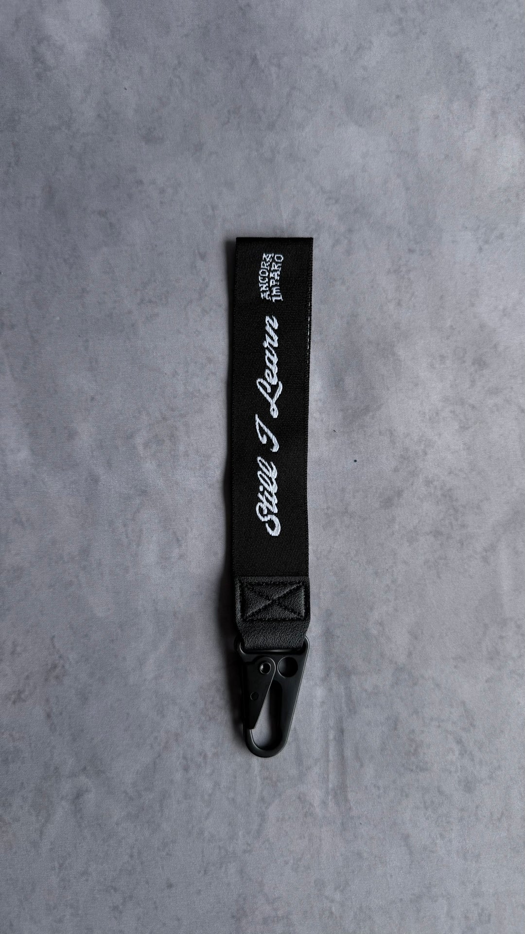 STILL I LEARN KEY STRAP