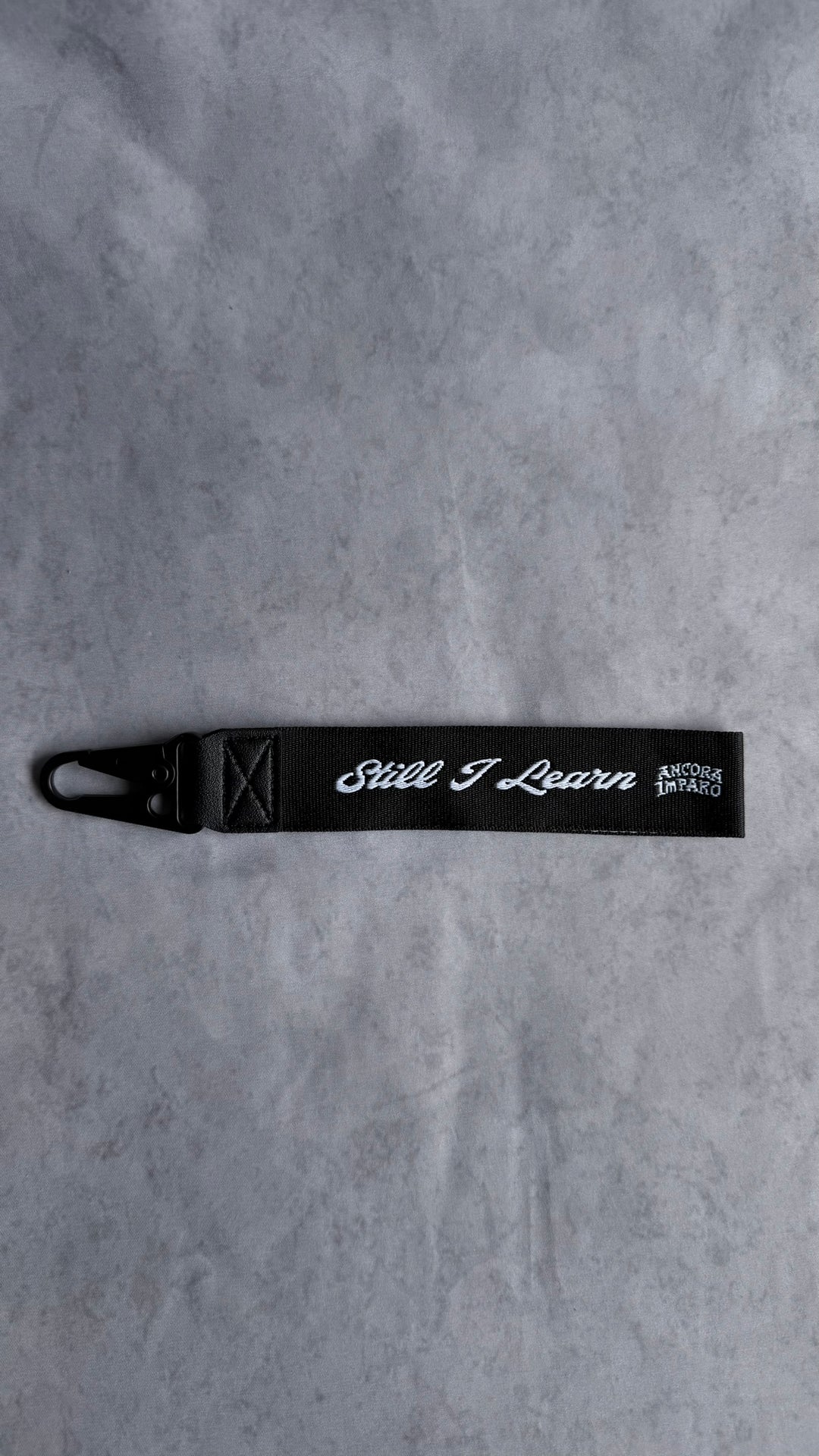 STILL I LEARN KEY STRAP