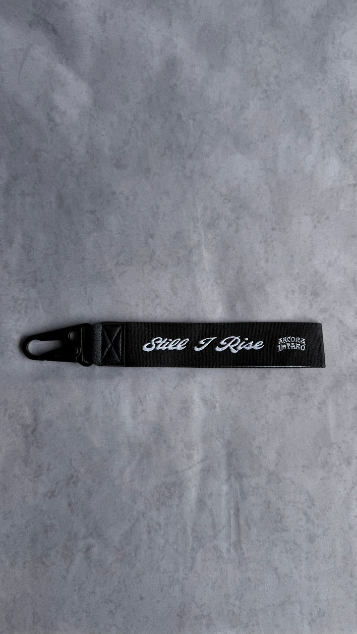 STILL I LEARN KEY STRAP