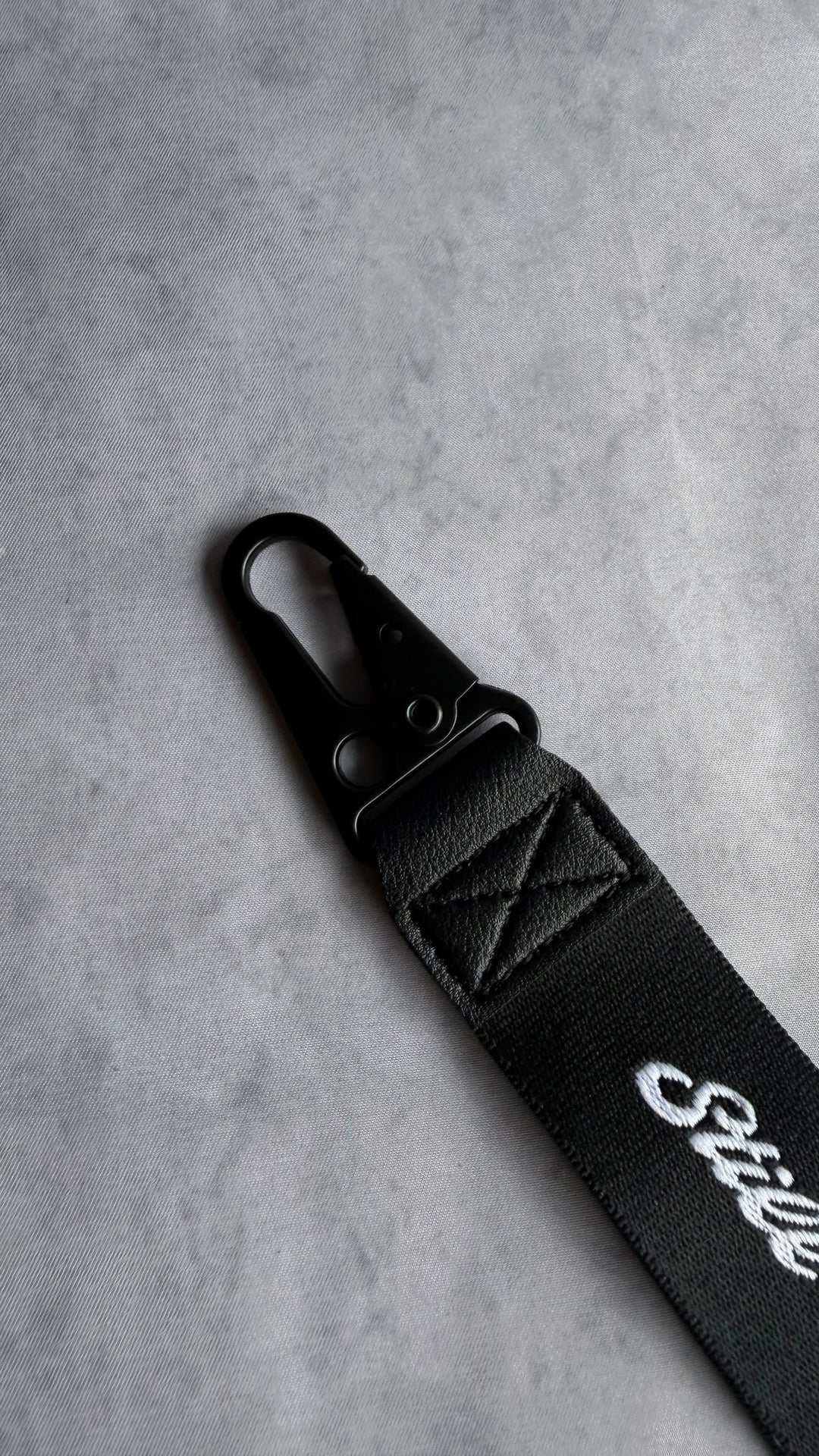 STILL I LEARN KEY STRAP