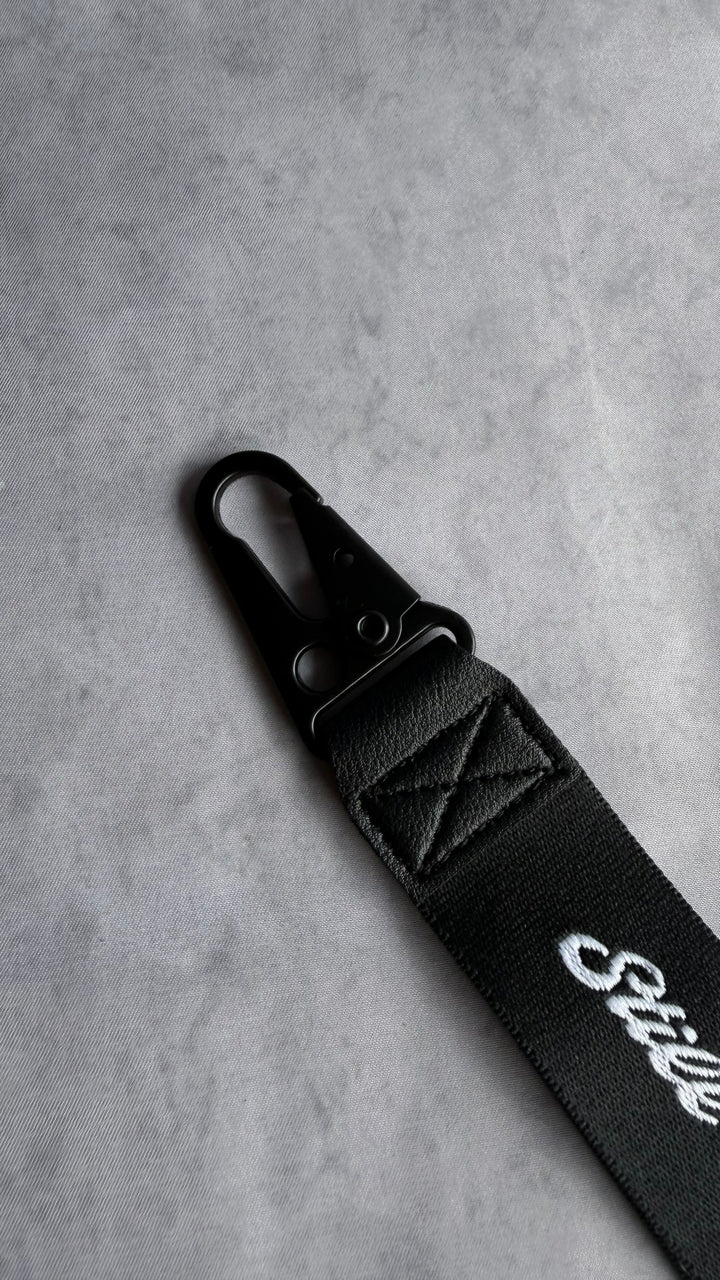 STILL I LEARN KEY STRAP