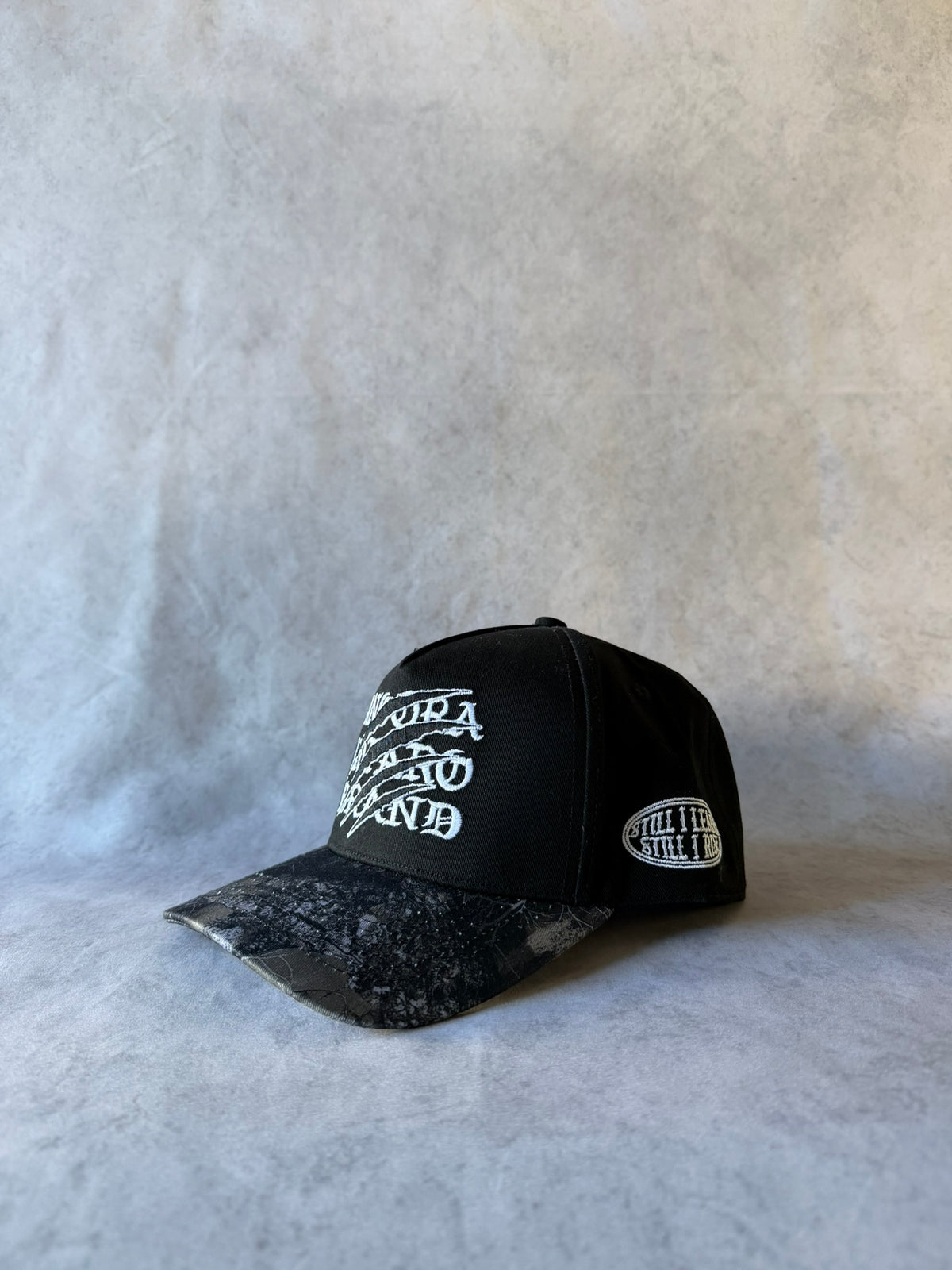 CAPPELLO MIMETICO TIGRATO