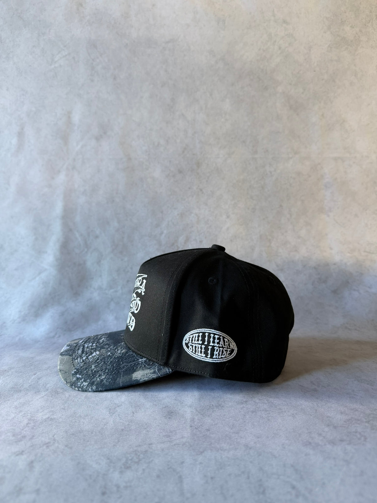CAPPELLO MIMETICO TIGRATO