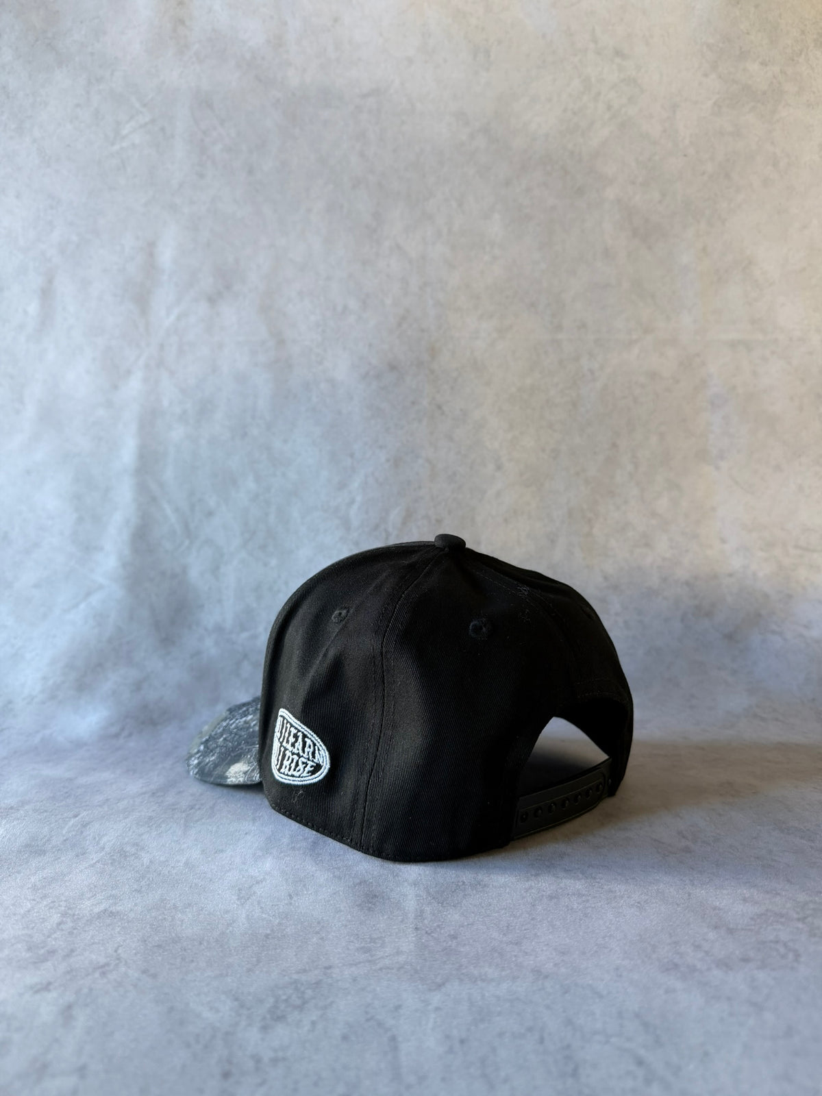 CAPPELLO MIMETICO TIGRATO