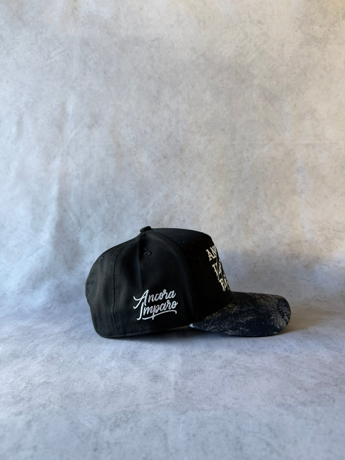 CAPPELLO MIMETICO TIGRATO