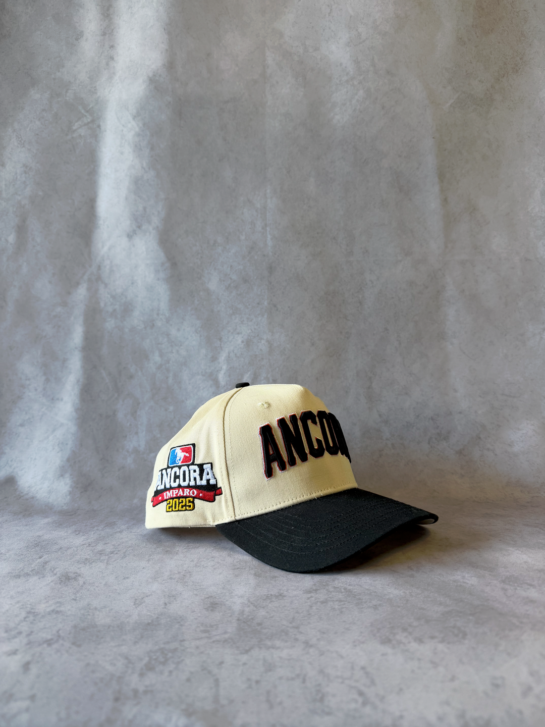 ANCORA 2025 WORLD SERIES SNAPBACK – CHAMPIONSHIP CREAM