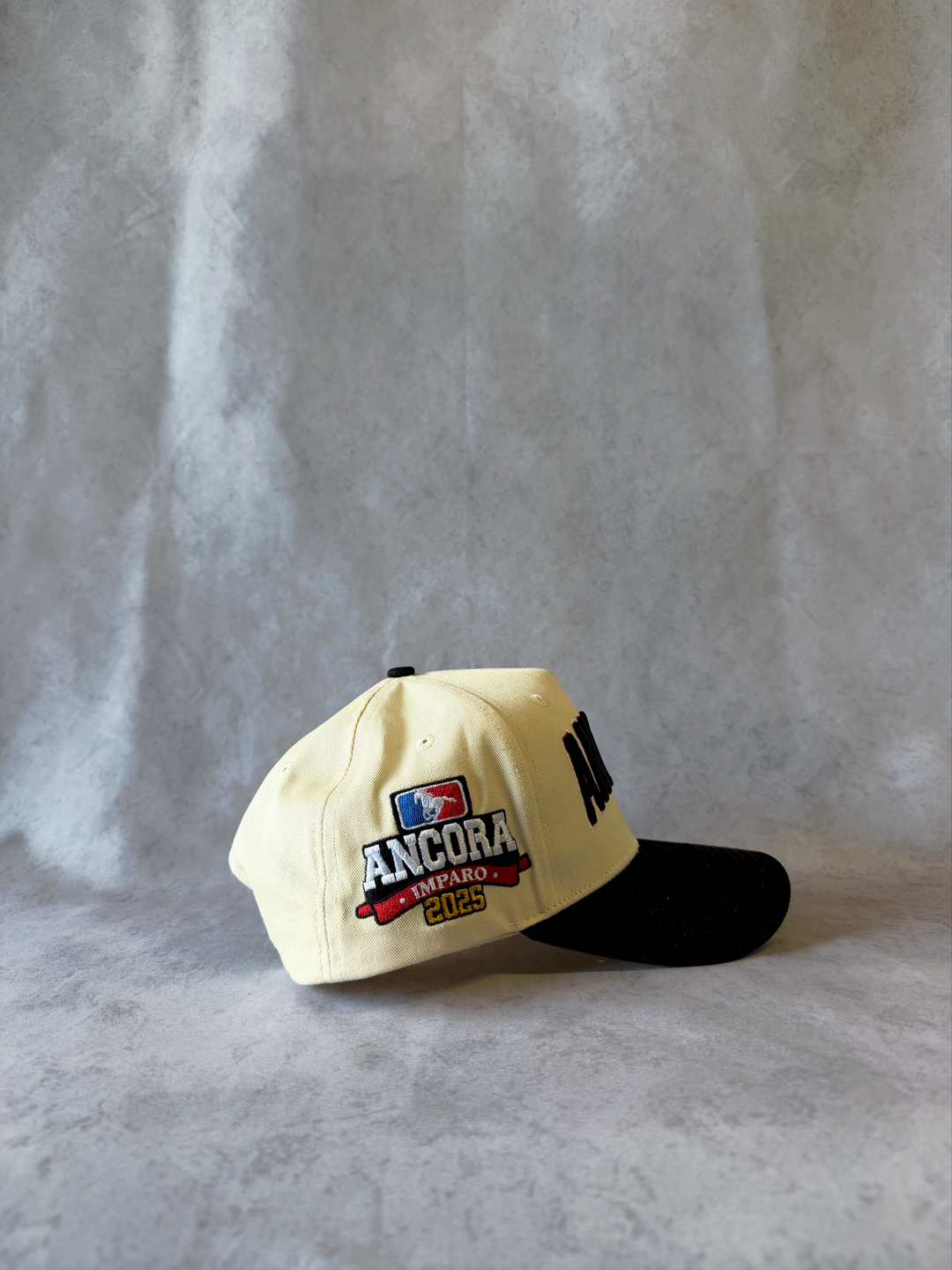 ANCORA 2025 WORLD SERIES SNAPBACK – CHAMPIONSHIP CREAM