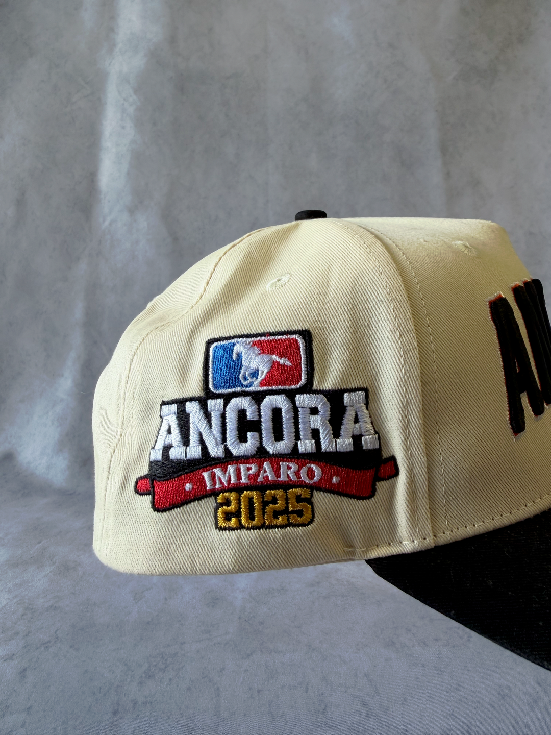ANCORA 2025 WORLD SERIES SNAPBACK – CHAMPIONSHIP CREAM